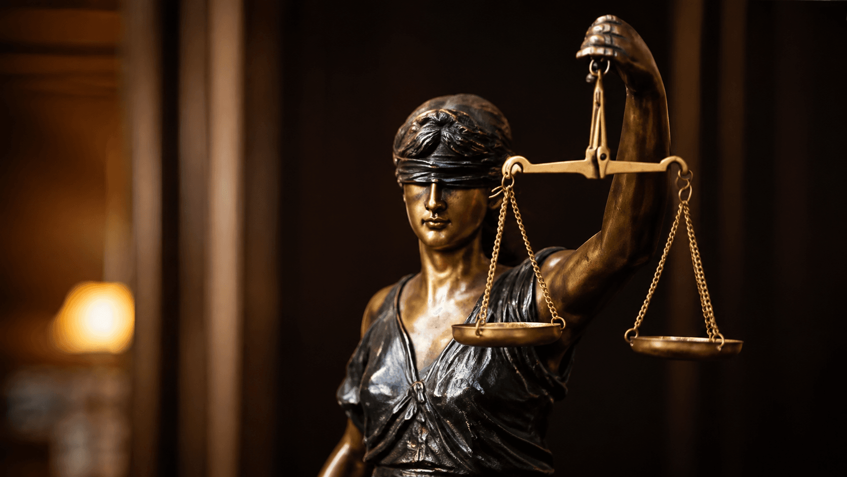 Drake, Hileman & Davis, PC Bronze Lady Justice with Balanced Scales
