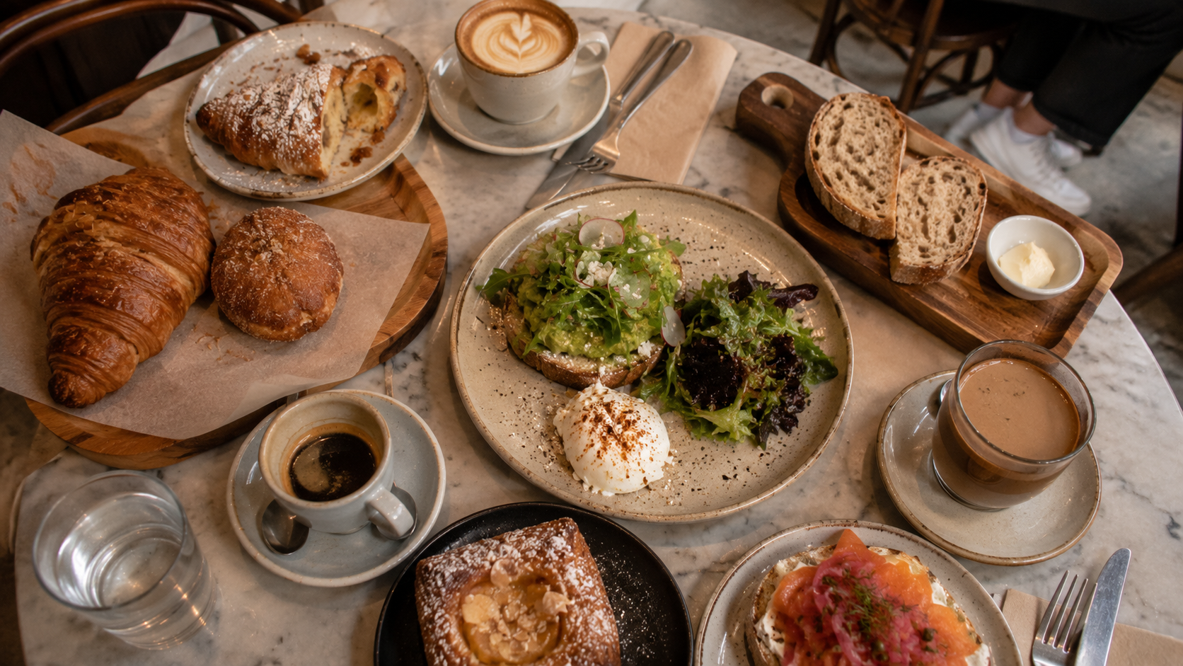 Le Marais Bakery Cozy brunch spread in rustic cafe