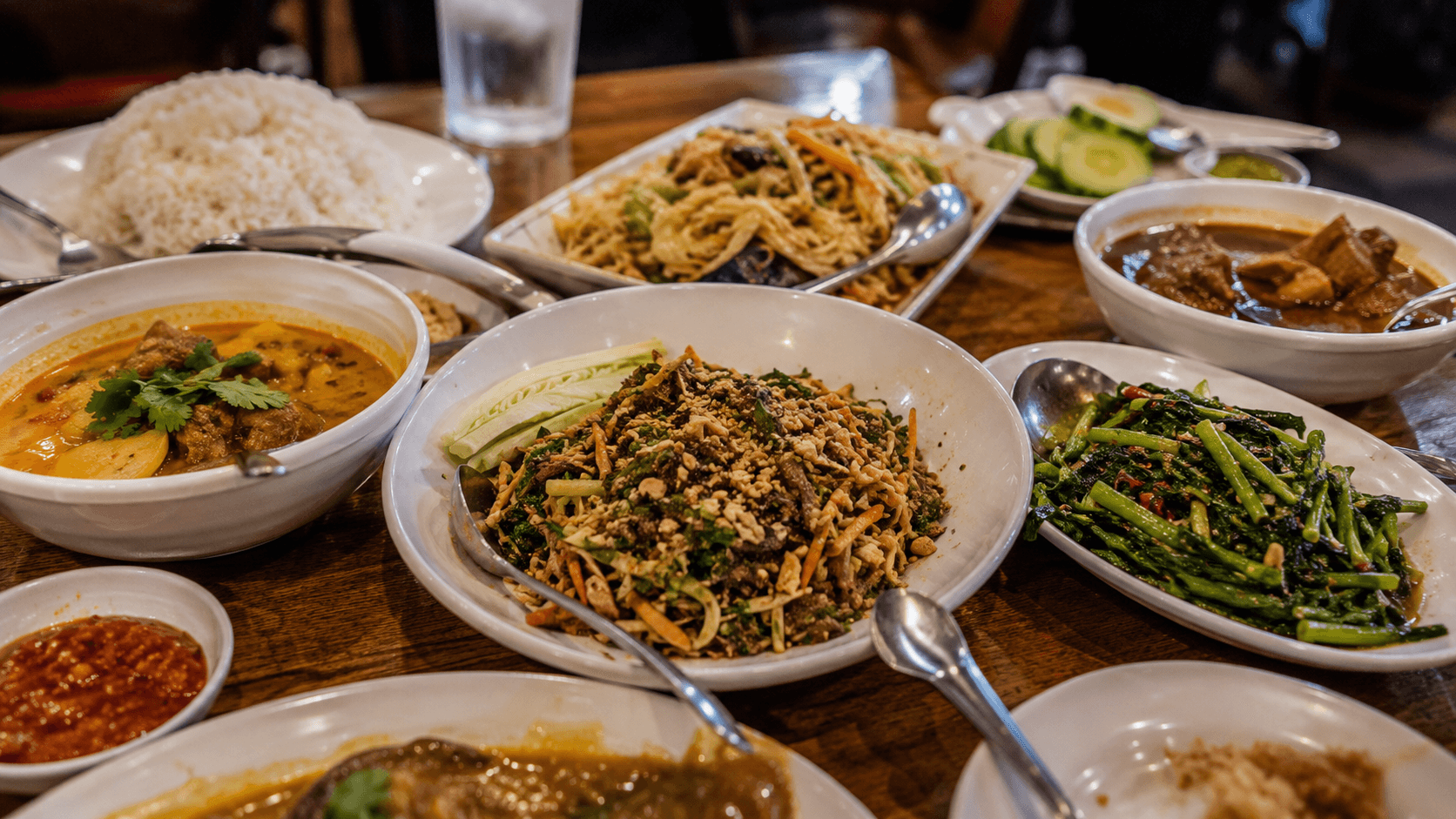 Mingalaba Restaurant - Southeast Asian feast on wooden table
