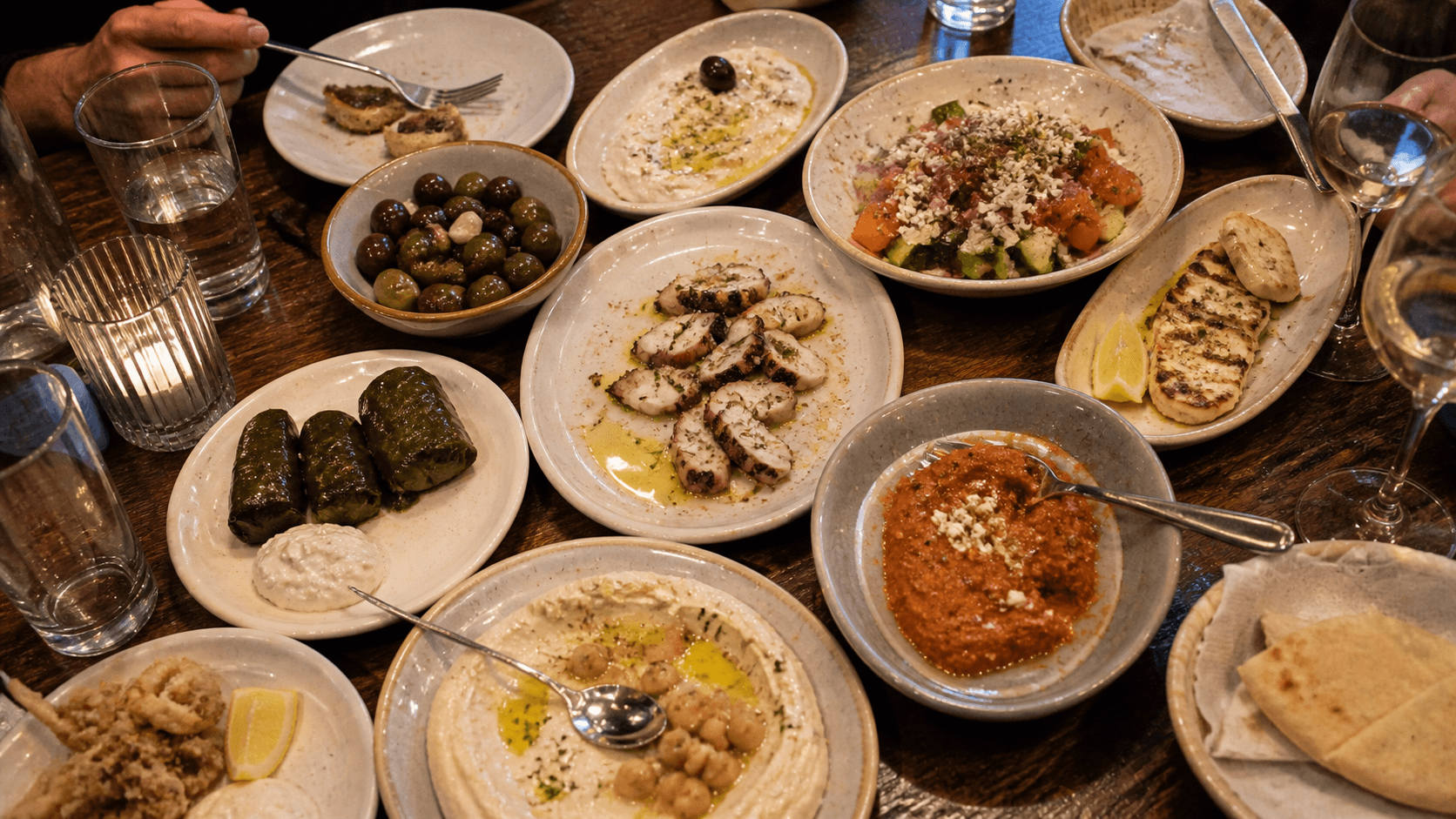 Mykonos Meze Burlingame - Mediterranean meze spread on wooden table