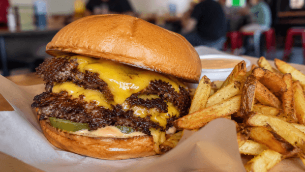 The Friendly Juicy double cheeseburger with crispy fries
