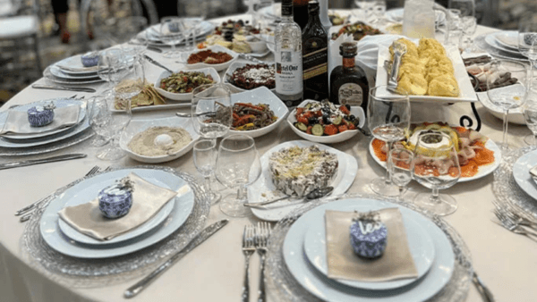 Banquet-hall-with-floral-centerpieces-round-dining-tables-and-upscale-event-decor.png